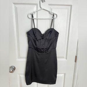 Brand new black, dynamite, dress in size extra small. The top is a corset.